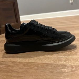 Alexander McQueen Patent Leather Black Men’s Oversized Low Top Sneaker.